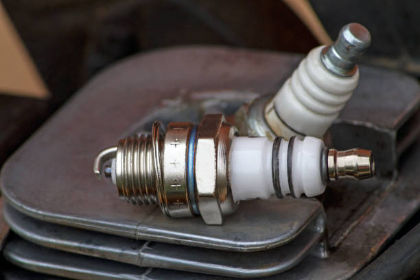istock New spark plug on the cylinder block 1171360817