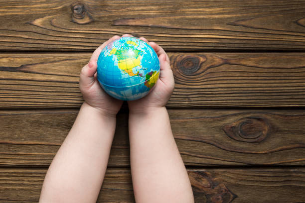 istock globe in the hands of a child 1171364067