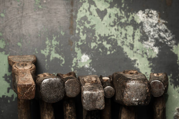 istock set of old hammers and rusty nails. tools on metal the surface. 1171364137