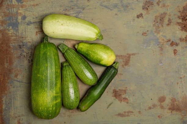 istock Fresh zucchini or green courgette, farm fresh produce, summer squash, overhead 1171364782