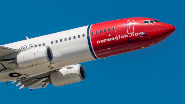 Boeing 737 MAX Norwegian Air takes off from Munich airport Munich, Germany - April 20, 2019: A Boeing 737-8JP, or Boeing 737 MAX, from Norwegian Air takes off from Munich Airport. The aircraft with registration EI-FJE has been in service since January 2012 for the Norwegian airline. 737 stock pictures, royalty-free photos & images