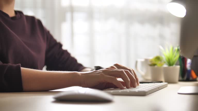 Woman typing on Keyboard Computer Keyboard