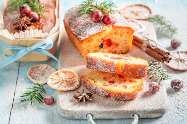 istock Homemade Fruitcake for Christmas decorated with spruce 1171368906