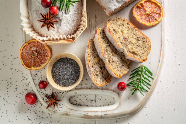 istock Traditionally poppy seed cake for Christmas decorated with spruce 1171370909