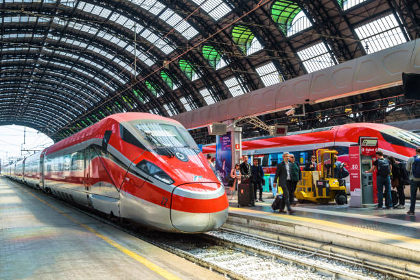 modern high-speed trains at the railway milan central station - travel passenger milan italy italy imagens e fotografias de stock