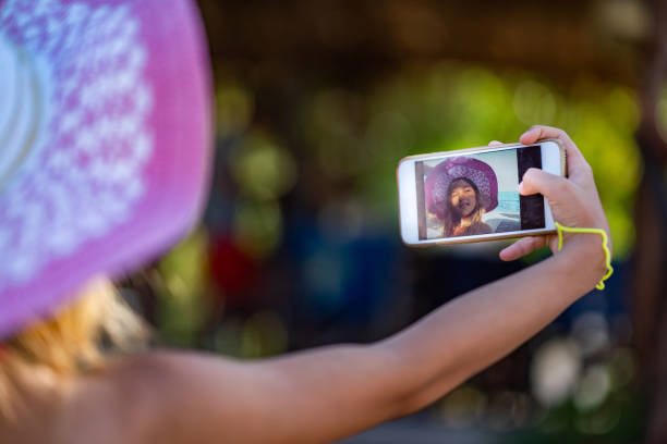 istock Reflection beauty girl in the phone camera 1171373408