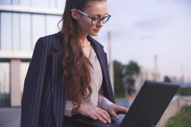 istock Young woman working on laptop 1171374859