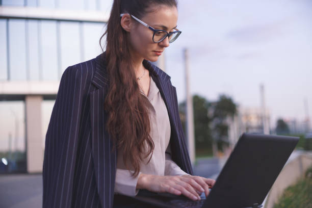 istock Young woman working on laptop 1171375088