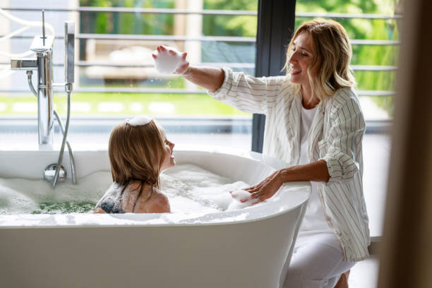 istock Happy mom taking foam with her hand 1171380968