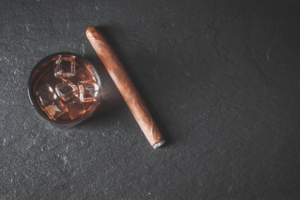istock Whiskey with ice and cigar. Top view with copy space 1171393255
