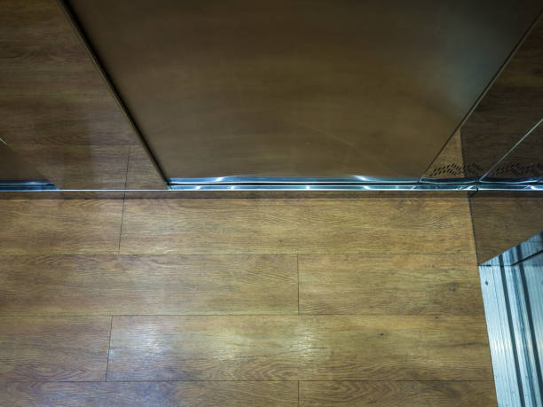 istock Laminate brown wood in the elevator at Rosa Khutor 1171394814