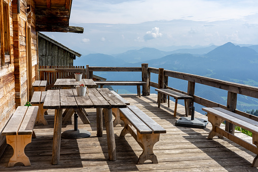 alm hut terrasse in tyrol with mountain view