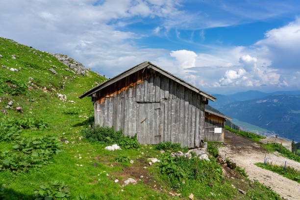 istock tyrol hut hut with mountains in the background 1171394930