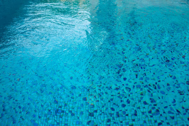 istock Swimming pool blue mosaic rock bottom. Texture. 1171395188
