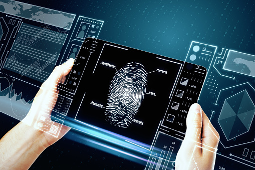 Hand holding smartphone with creative finger print scan hologram on blue background. ID and protection concept. Double exposure