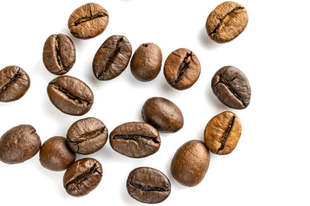 istock Roasted coffee beans isolated in white background cutout. Coffee background or texture concept. 1171400217