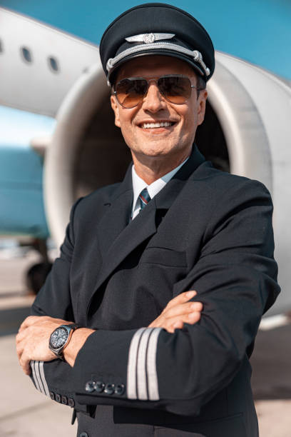 istock Mature man in uniform having rest after work in aiport 1171400285