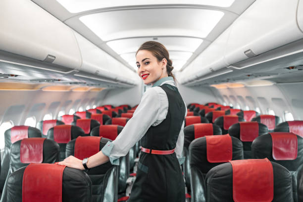 istock Pretty Caucasian stewardess is on duty on board 1171404346