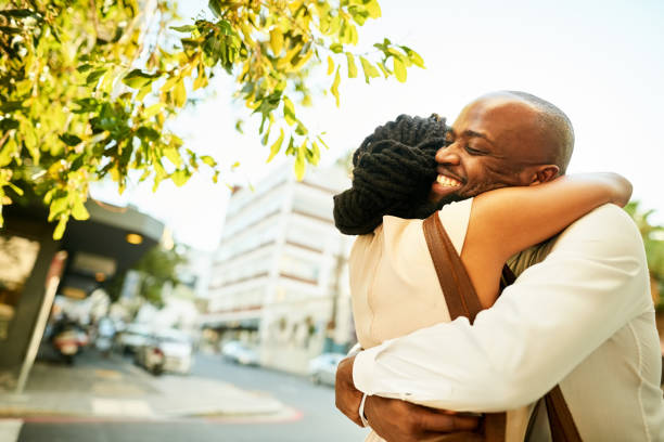 istock Couple embracing outdoors 1171408757