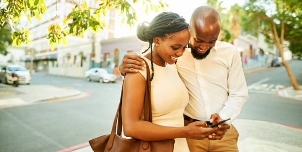 istock Couple checking social media updates 1171408840