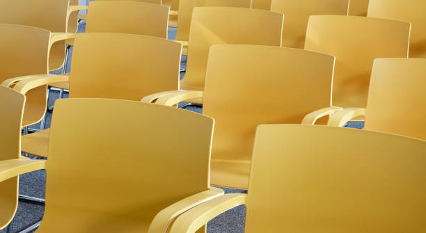 istock Yellow chairs empty seats modern vivid color 1171411766