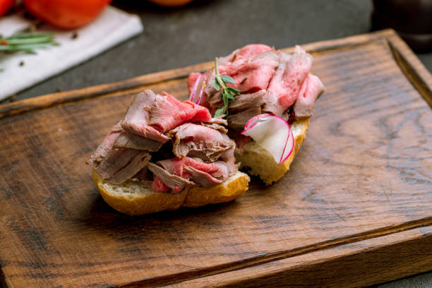 istock Bruschetta with roast beef on the board 1171413242