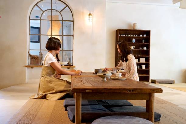istock Young women enjoying Chinese tea 1171414155