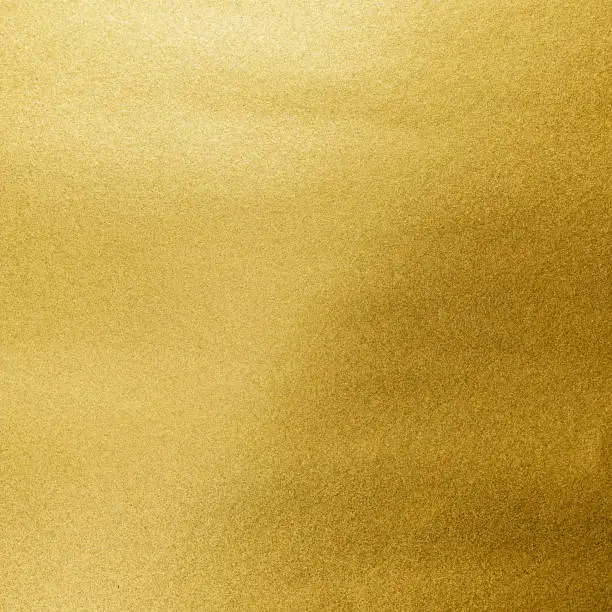 Photo of Gold foil leaf shiny wrapping paper texture background for wall paper decoration element