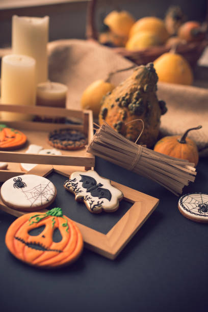 istock Halloween cookies, small pumpkins and decor 1171415065
