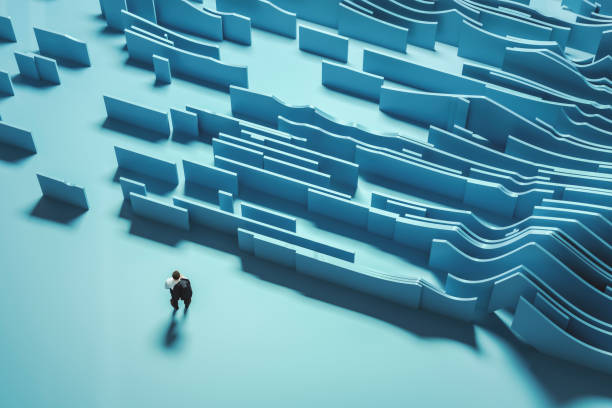 istock Businessman in front of maze 1171422707