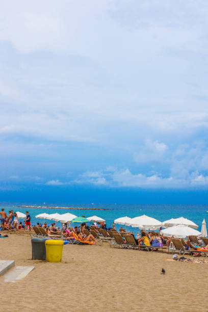 Barceloneta Beach (Barcelona,​​Spain) Barceloneta Beach (Barcelona,​​Spain). Shooting Location: Barcelona 日傘 stock pictures, royalty-free photos & images