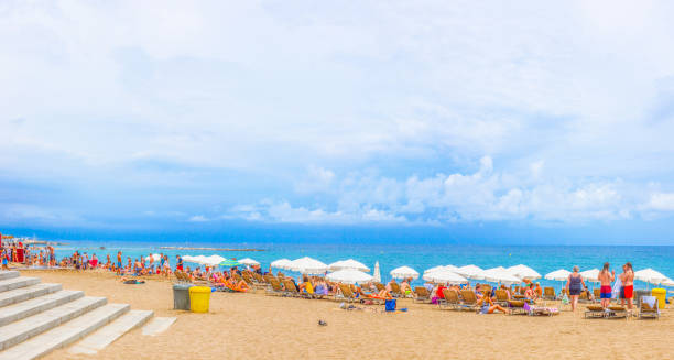 Barceloneta Beach (Barcelona,​​Spain) Barceloneta Beach (Barcelona,​​Spain). Shooting Location: Barcelona 日傘 stock pictures, royalty-free photos & images