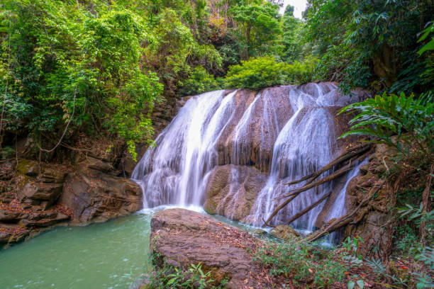 istock Waterfall in deep rain forest jungle (Thung Nang Khruan Waterfall) Thailand 1171426267