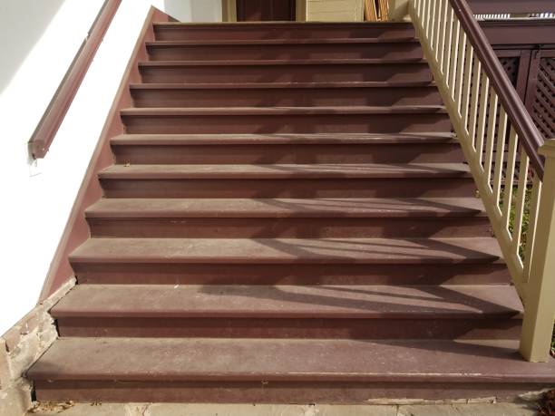 istock brown stairs or steps with railing and shadows 1171428123