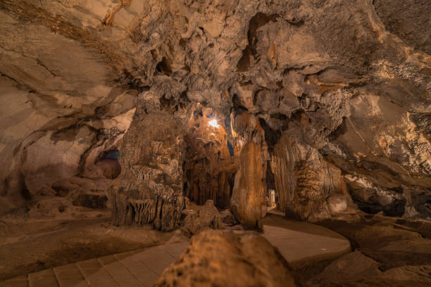 istock pathway underground cave in Laos, with stalagmites and stalactites 1171428248
