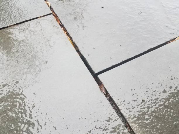 istock water on wet grey stone or rock tiles 1171429245