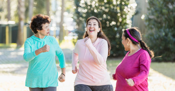 istock Three Hispanic woman in park, jogging 1171429400