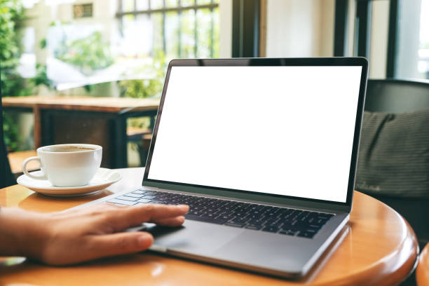 istock a woman using and touching laptop touchpad with blank white desktop screen 1171430383