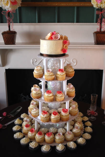 istock Wedding cupcakes and Wedding Cake on display 1171432141