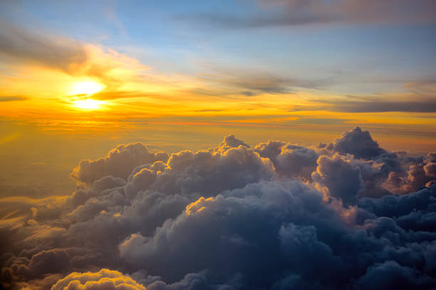 istock sunrise view from airplane with cloudy 1171433154