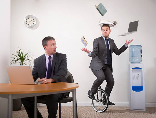 office multi-tasker - jongleren stockfoto's en -beelden
