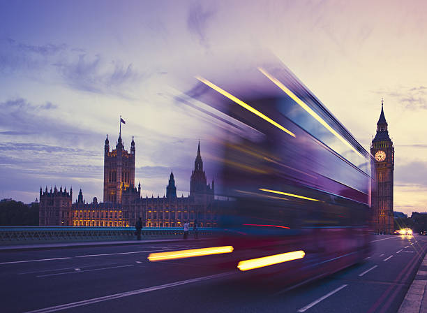 istock Bus motion blur and Big Ben Tower Clock 117144411