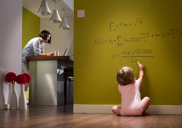 child prodigy baby girl works out her equations whilst mum is oblivious finding photos stock pictures, royalty-free photos & images