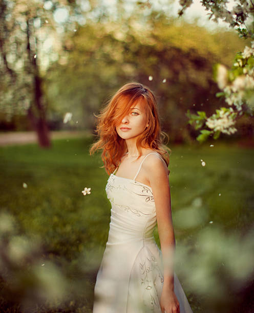 istock Redheaded Woman in Park 117144656