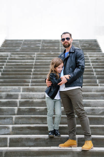 istock Dad and daughter walk around the city 1171447204