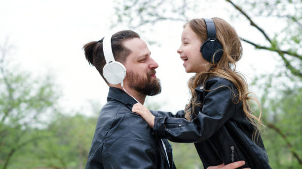 istock Dad and daughter walk around the city 1171447208