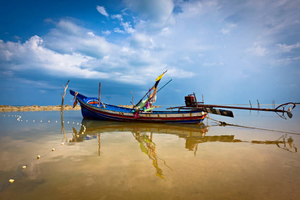 istock thailand longtail fishing boat 117144769