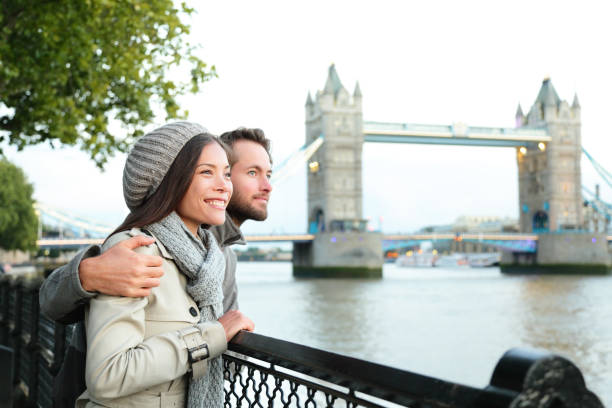 istock Happy couple by Tower Bridge, River Thames, London 1171448650
