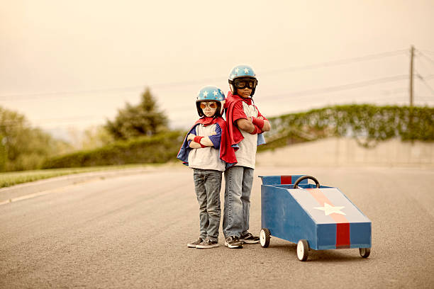 boxcar racers - car child teamwork sports race zdjęcia i obrazy z banku zdjęć