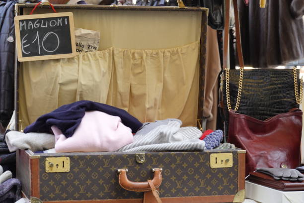 Milan, Italy - August 25, 2019: Louis Vuitton suitcase in a flea market.